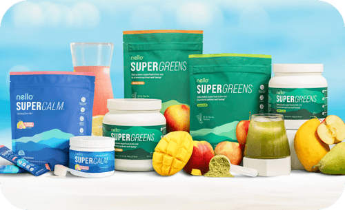 Assorted Nello Supercalm and Supergreens products with fruits on a table.