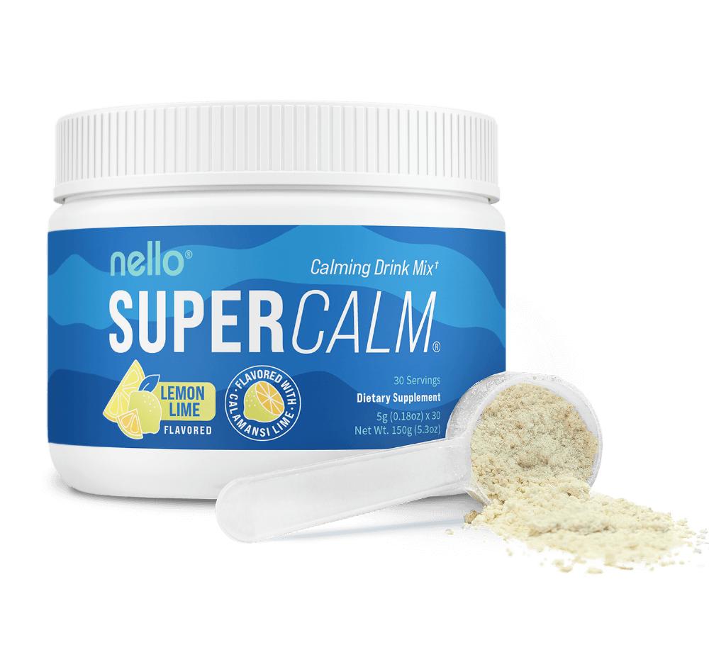 Container of lemon lime flavored calming drink mix with a scoop of powder.