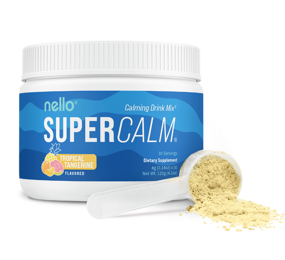 Container of SuperCalm drink mix with a scoop of powder.