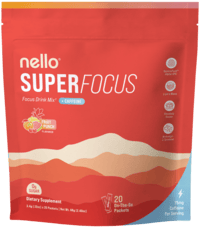 Nello SuperFocus drink mix surrounded by lemons, limes, and a glass of the beverage.